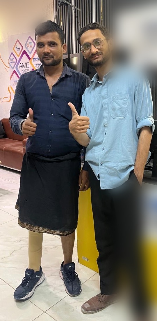 Patient with our team — thumbs up